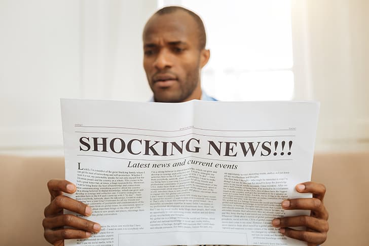 Man Reading Shocking News